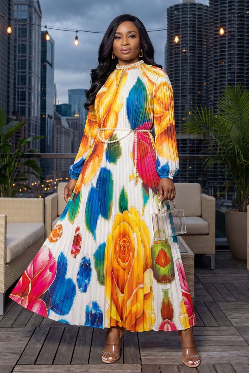 Woman in a colorful dress standing on a rooftop with cityscape background