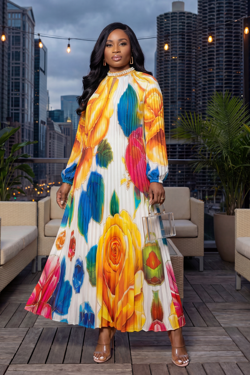 Woman in a colorful dress standing on a rooftop with cityscape background