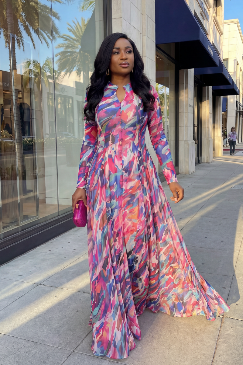 Woman in a colorful dress standing on a city street
