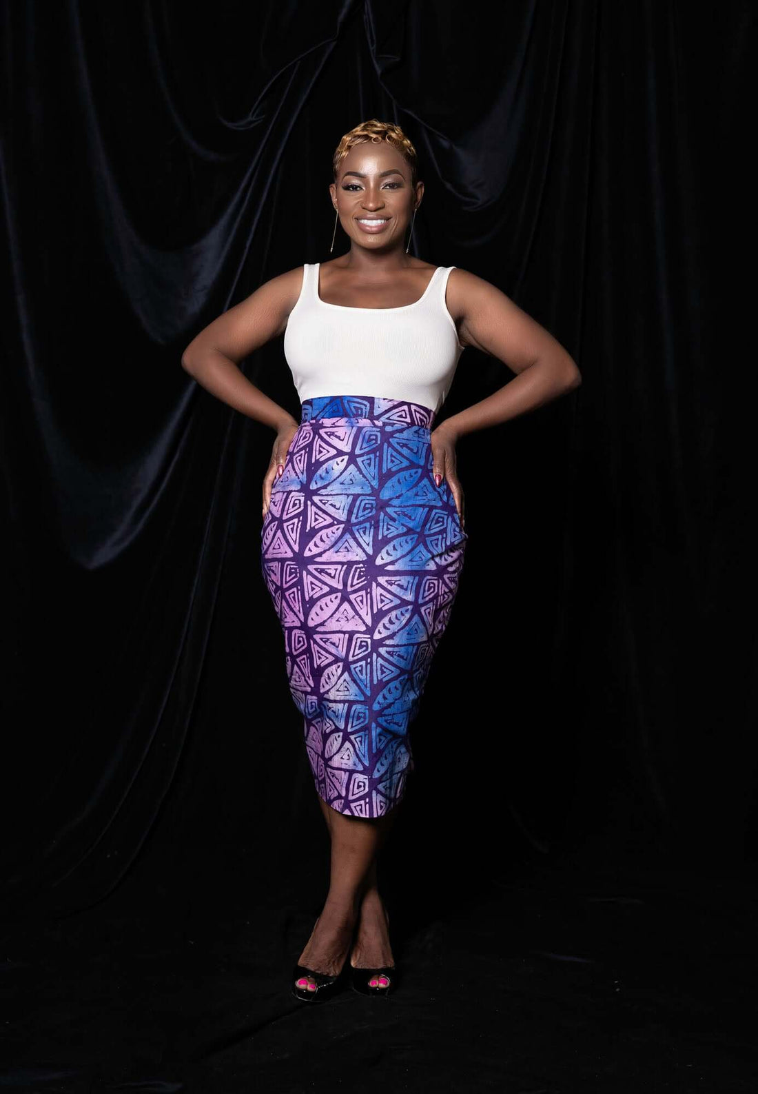 "Melody Adire Pencil Skirt, elegant and fitted"
"Chic Melody Adire Pencil Skirt with bold patterns"
"Melody Adire Pencil Skirt, stylish and contemporary"
"Sophisticated Melody Adire Pencil Skirt for versatile wear"
"Melody Adire Pencil Skirt, perfect for any occasion"
"Trendy Melody Adire Pencil Skirt with a modern twist"
"Melody Adire Pencil Skirt, adding cultural flair to your wardrobe"
"Fitted Melody Adire Pencil Skirt for a sleek silhouette"
"Melody Adire Pencil Skirt, designed for effortless elegance"
